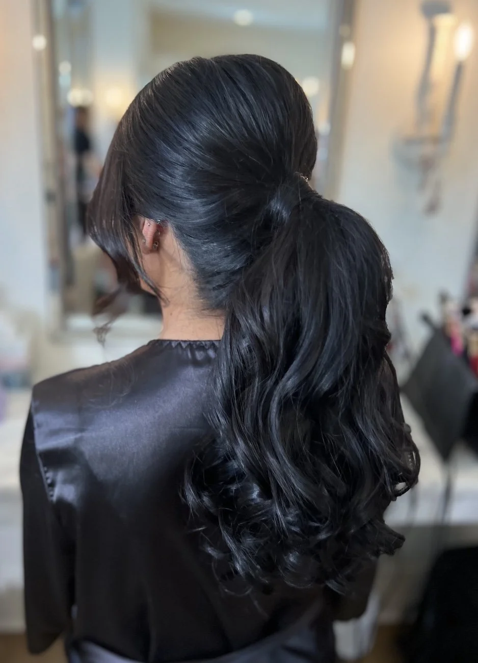 Mid-Back Ponytail With Curls and Side Bangs Mid-Back Ponytail With Curls and Side Bangs — Jet Black Hair