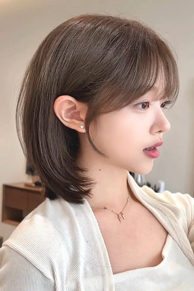 Hush Layered Lob With See-Through Bangs Hush Layered Lob With See-Through Bangs — Mushroom Brown Hair