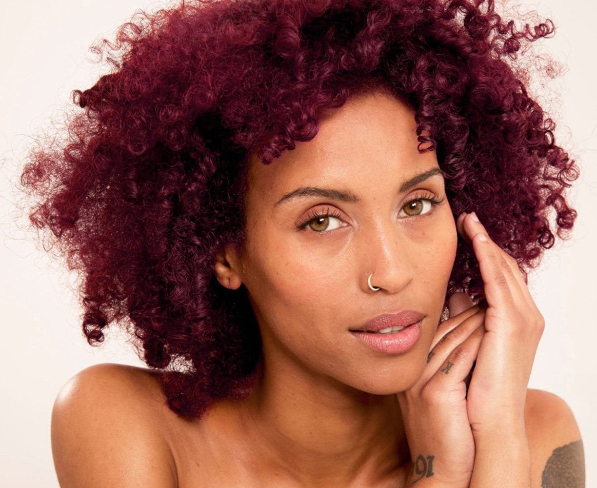 Natural Curls in Deep Red — Winter Hair Colors for Black Women