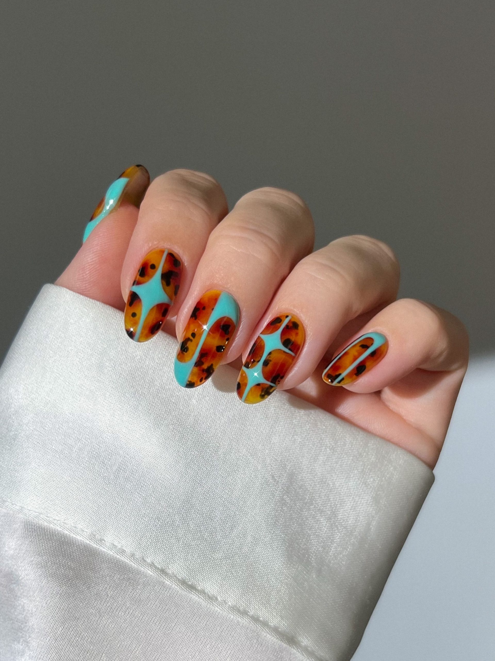 Bold Turquoise Tortoiseshell Almonds Bold Turquoise Tortoiseshell Almonds — Almond Nail Designs