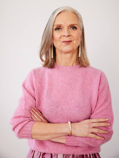 Charming Pink Knit Sweater with Gold Accessories — Winter Outfits for Older Women