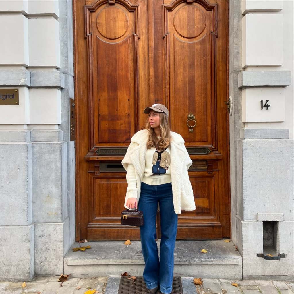 Cozy Cream Sherpa Jacket Over a Graphic Knit Sweater Cozy Cream Sherpa Jacket Over a Graphic Knit Sweater — Winter Brunch Outfits