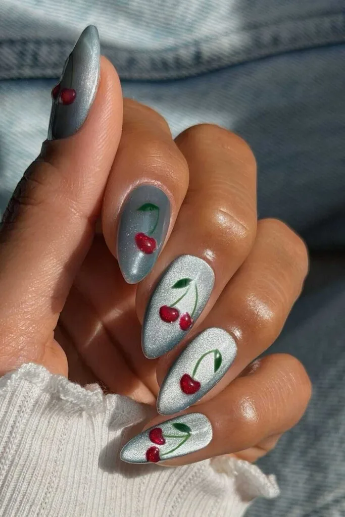 Grey Cat Eye With Cherry Motif Stiletto Nails Grey Cat Eye With Cherry Motif Stiletto Nails — Velvet Nails