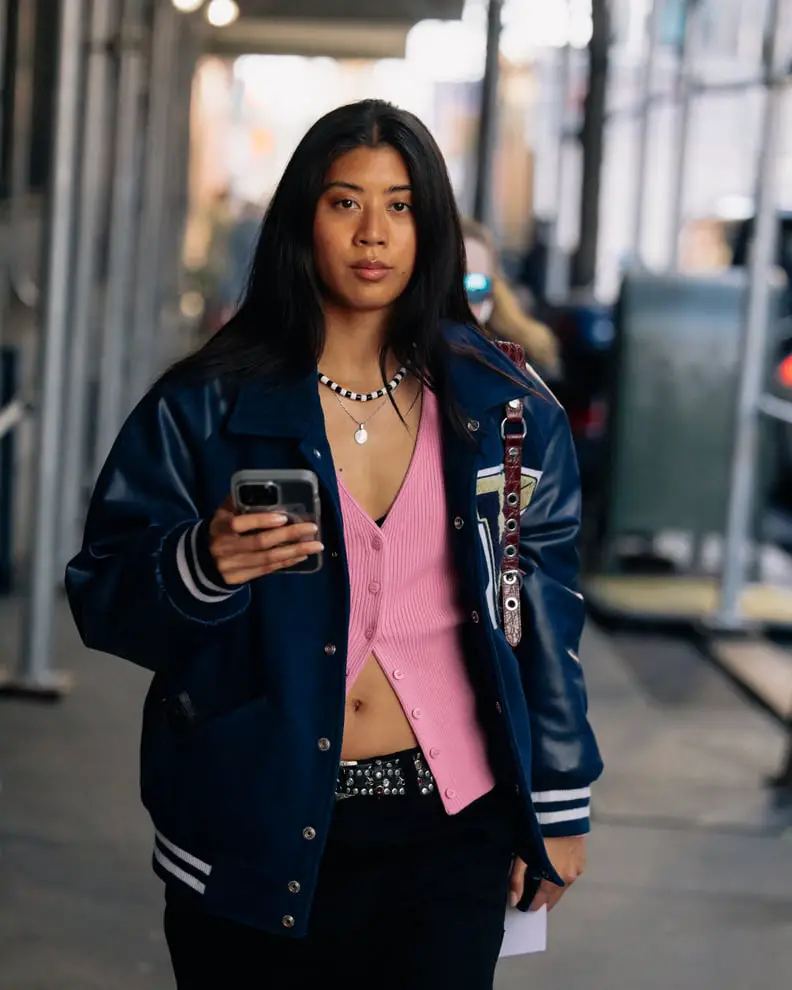 Pink Cardigan Under Varsity Jacket for Streetwear Style Pink Cardigan Under Varsity Jacket for Streetwear Style — Cardigan Outfits