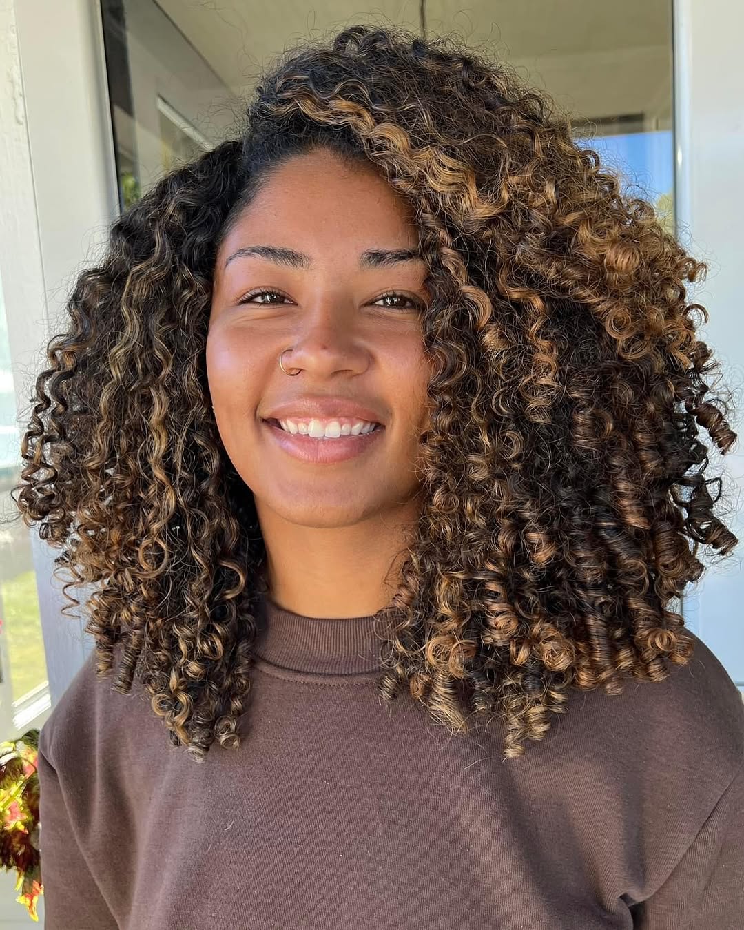 Dark Brown Curls with Auburn Fringe — Winter Hairstyles for Curly Hair