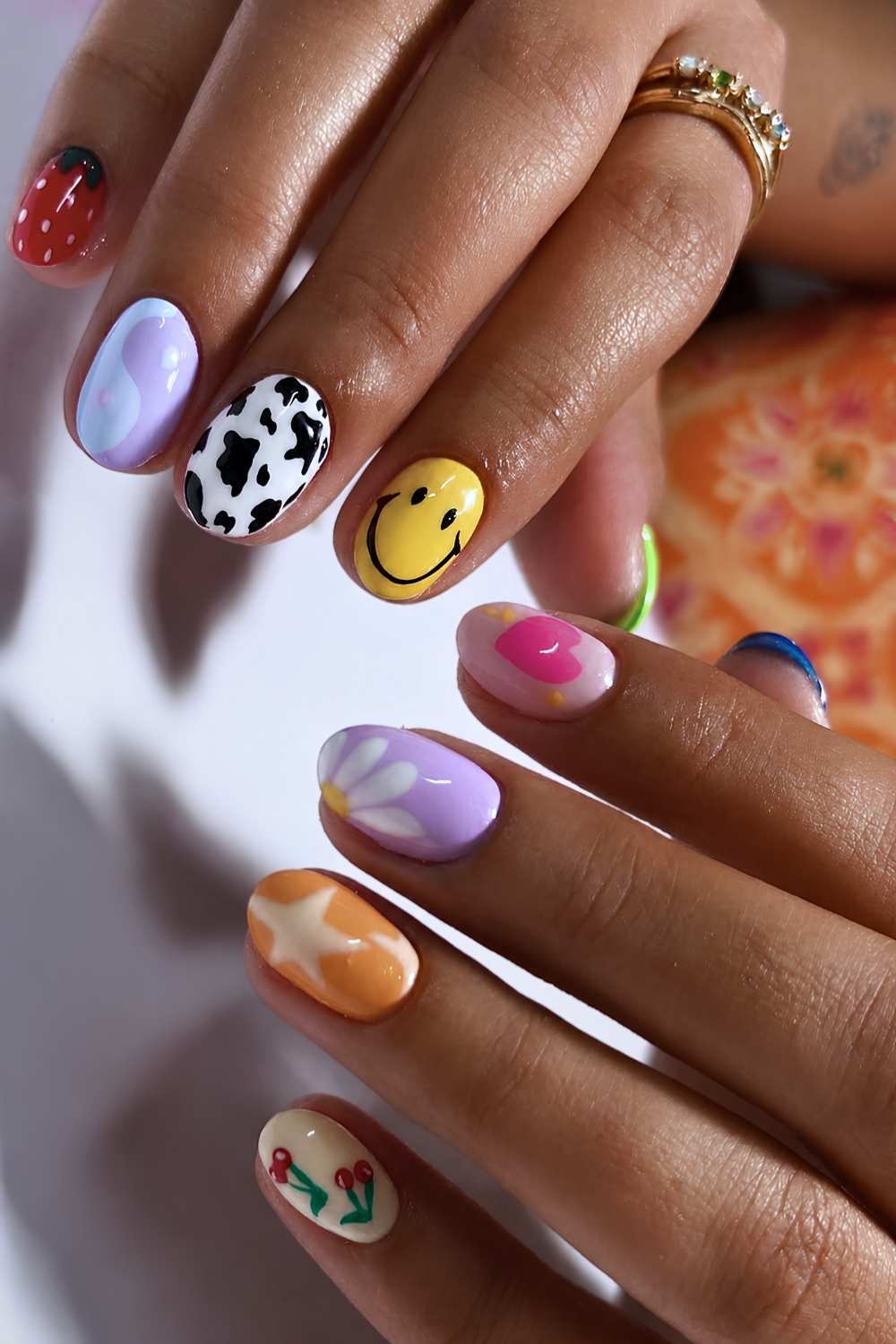 Eclectic Pop Culture Short Oval Nails Eclectic Pop Culture Short Oval Nails — Short Nail Designs
