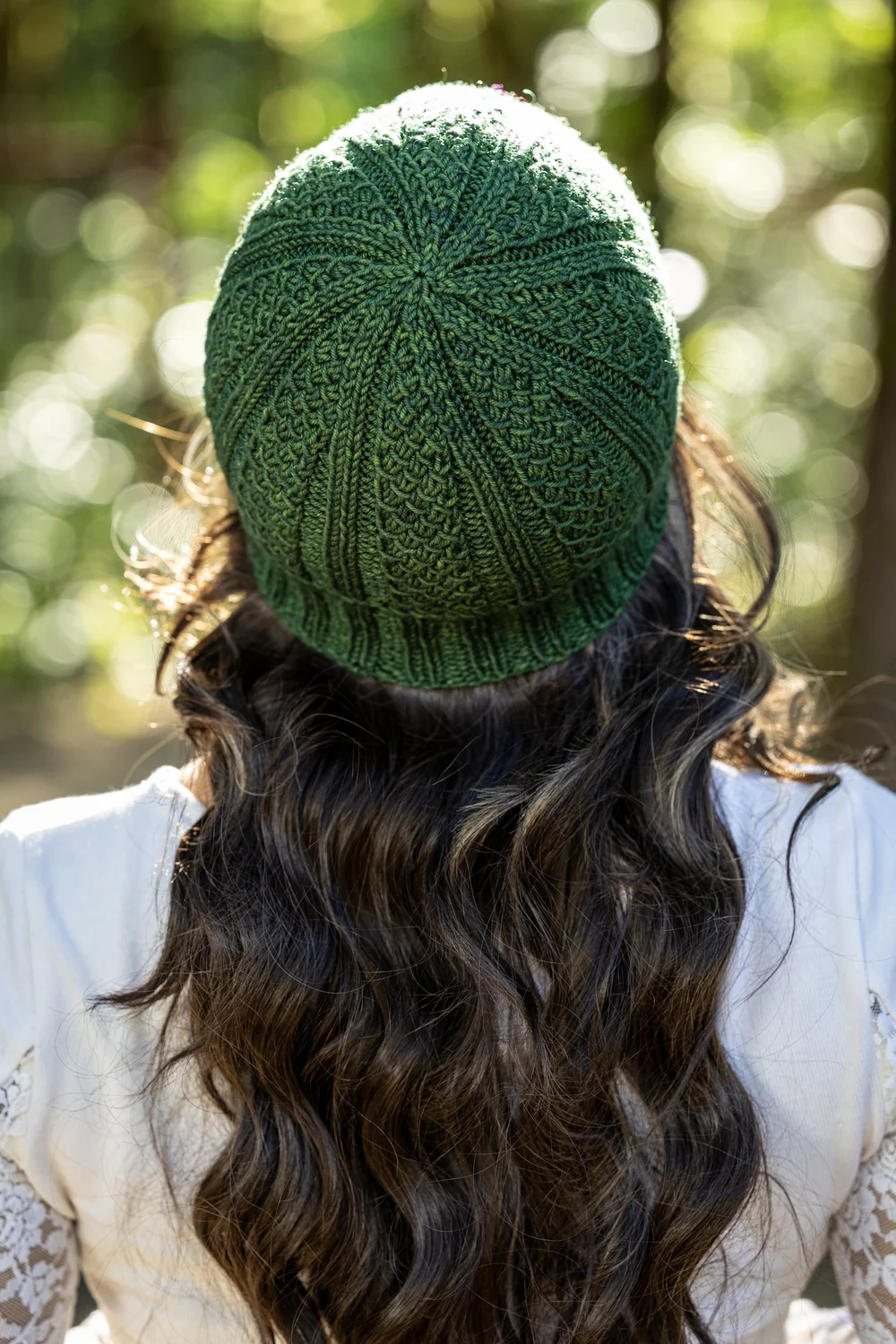 Mid-Back Wavy Dark Brown Hair with Intricate Knit Hat Mid-Back Wavy Dark Brown Hair with Intricate Knit Hat — Winter Hat Hairstyles