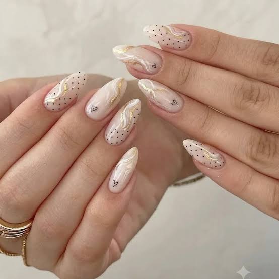 Medium Almond Milky White with Gold Marbling and Hearts Medium Almond Milky White with Gold Marbling and Hearts — Trendy Simple Nail Designs