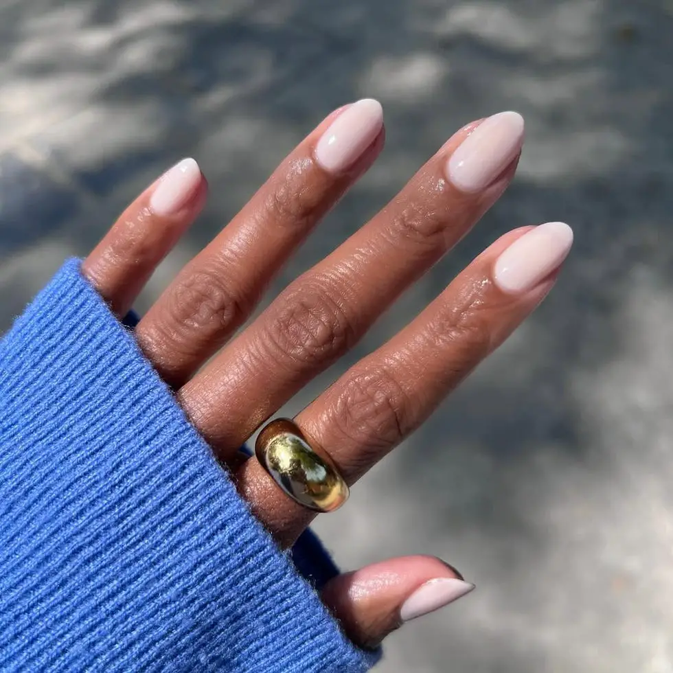 Sheer Nude Pink Glossy Oval Nails Sheer Nude Pink Glossy Oval Nails — Winter Nail Colors for Women Over 50