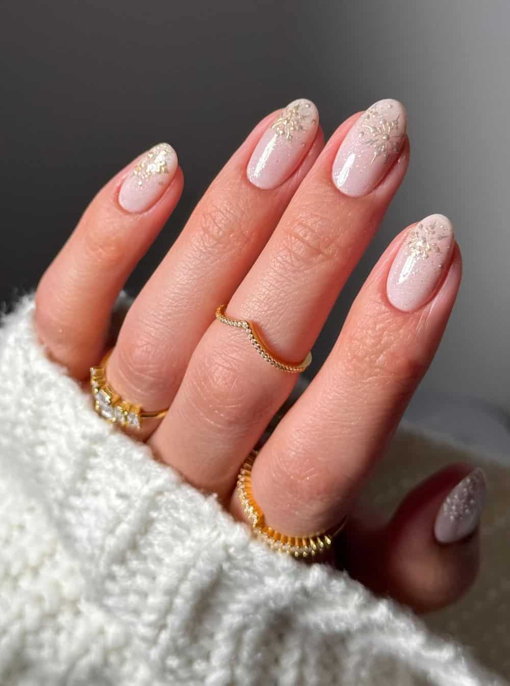Short Oval Pale Pink with Gold Snowflake Decals — January Nails