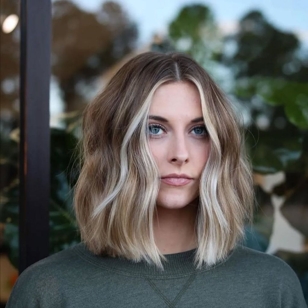 Dark Blonde Bob With Face-Framing Highlights Dark Blonde Bob With Face-Framing Highlights — Medium Length Winter Haircuts