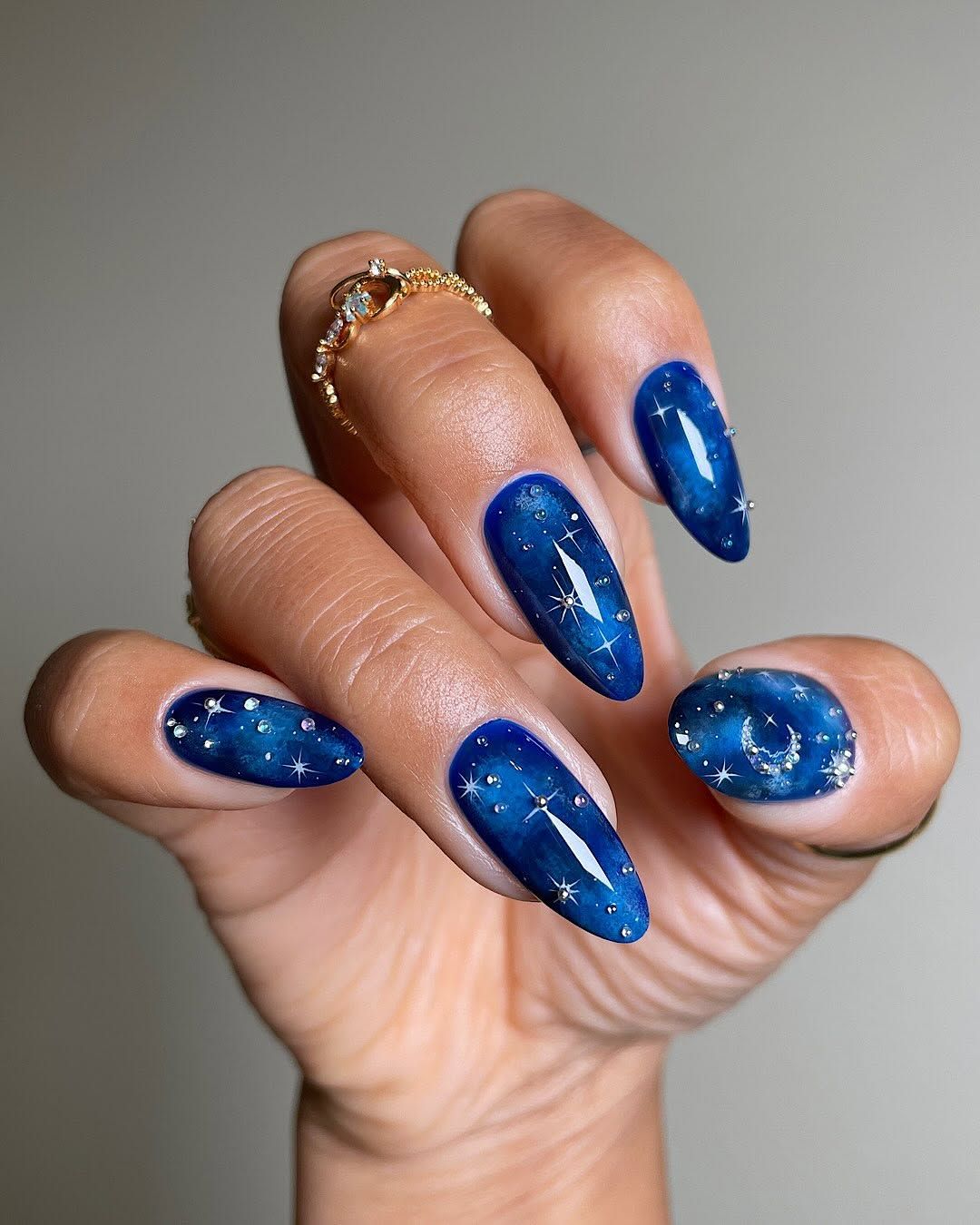 Deep Blue Celestial Moon and Stars Deep Blue Celestial Moon and Stars — Medium Length Winter Nails