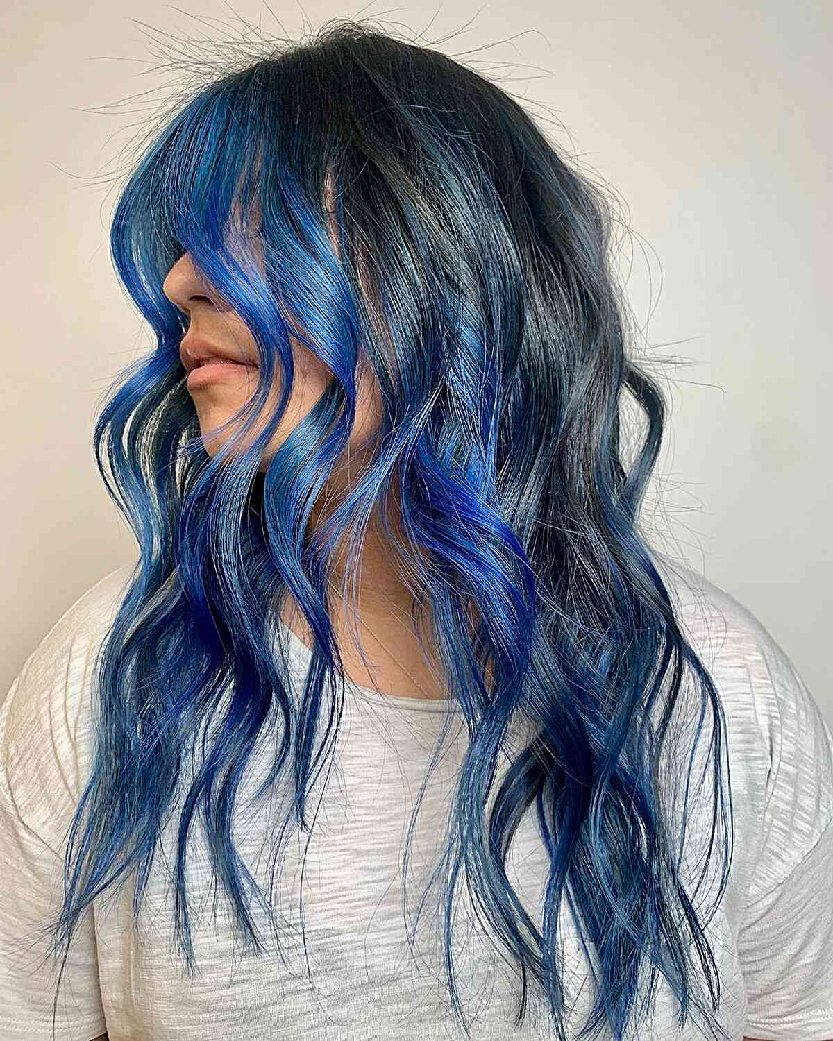 Dark Base With Blue Teal Streaks Dark Base With Blue Teal Streaks — Winter Hair Colors for Blue Eyes