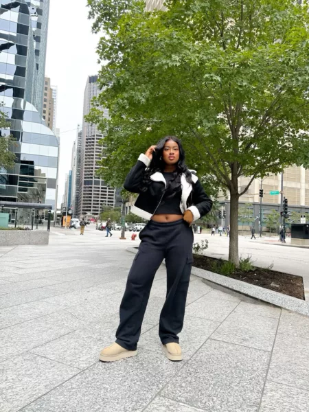 Streetwear Edge: Tan Uggs with Black Cargo Pants and Cropped Jacket Streetwear Edge: Tan Uggs with Black Cargo Pants and Cropped Jacket — Ugg Slippers Outfits