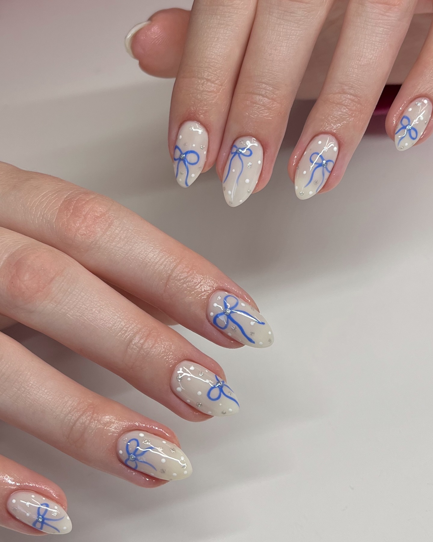 Off-White Blue Bow Dot Almond Nails — Winter Gel Nails