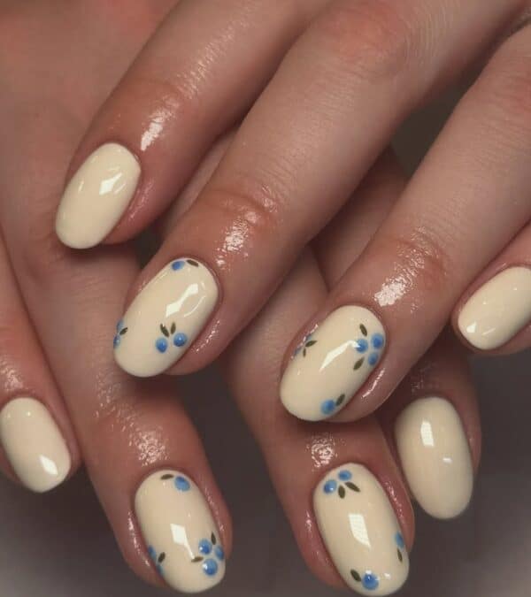 Pale Creamy Yellow with Blue Florals Pale Creamy Yellow with Blue Florals — Yellow Nail Designs