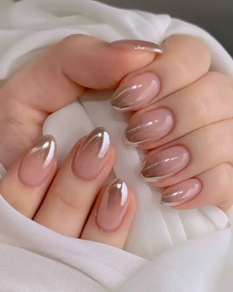 Glossy With Metallic Sheen And Glitter Visual Idea Glossy With Metallic Sheen And Glitter Visual Idea — Winter Nude Nails