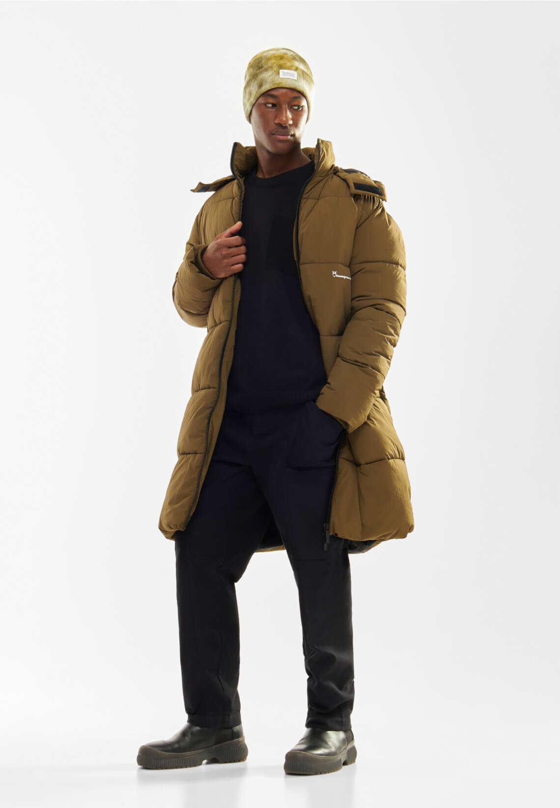 Functional Warmth: Longline Puffer and Camo Beanie Functional Warmth: Longline Puffer and Camo Beanie — Winter Outfits for Men