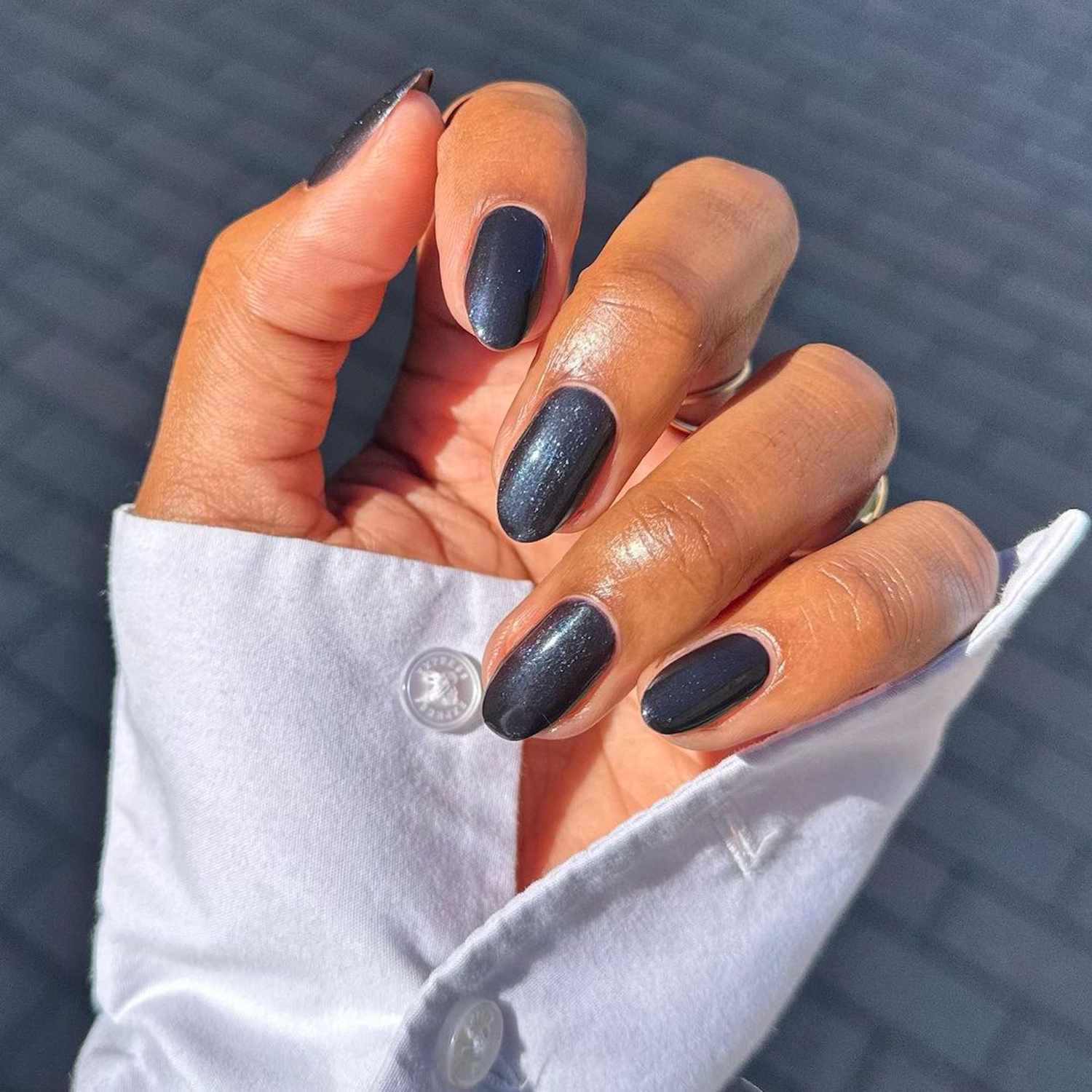 Matte Black With Blue Glitter And Snowflake Accent Matte Black With Blue Glitter And Snowflake Accent — Winter Black Nails