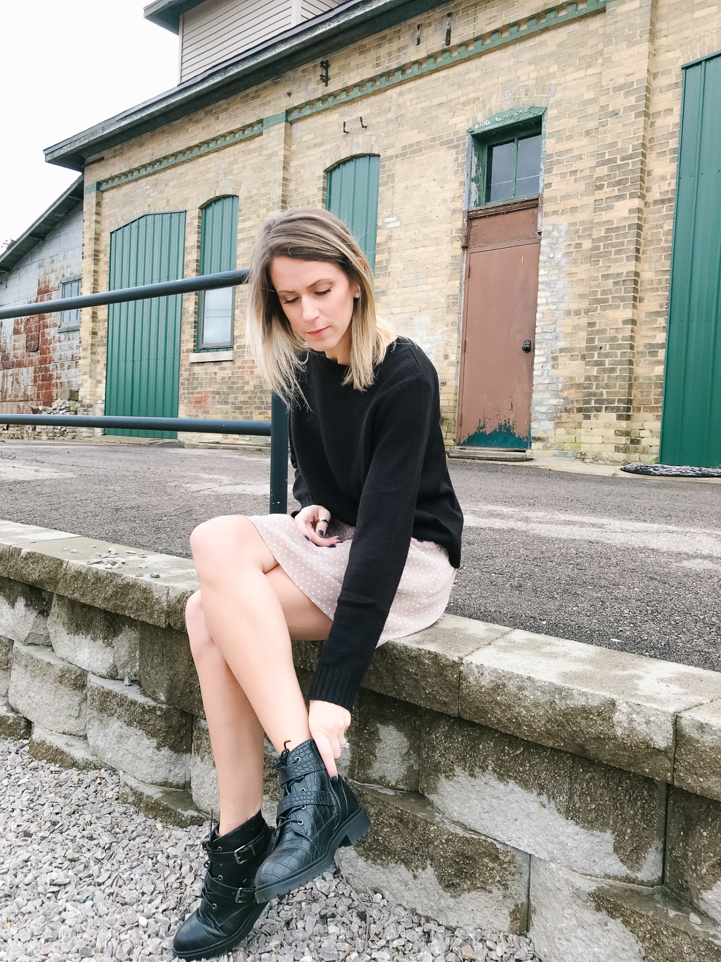 Polka Dot Mini Skirt and Crewneck Sweater with Black Combat Boots Polka Dot Mini Skirt and Crewneck Sweater with Black Combat Boots — Combat Boots Outfits