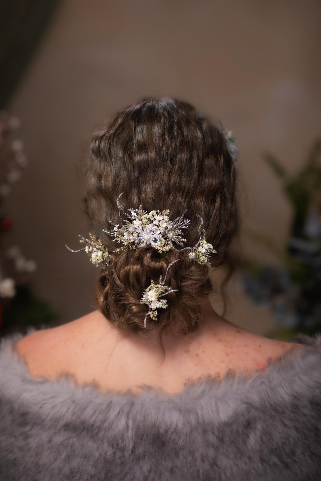 Dark Brown Low Bun With Winter Accessory Dark Brown Low Bun With Winter Accessory — Winter Wedding Hairstyles