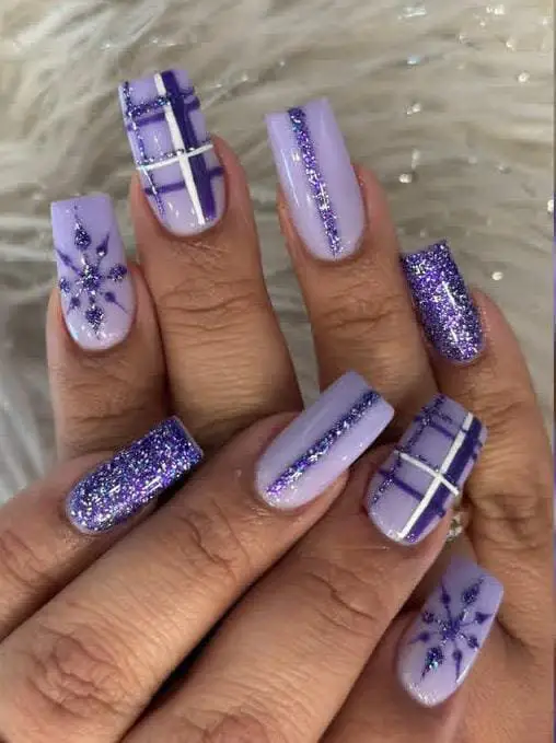 Pastel Purple Coffin Nails with Winter Motifs Pastel Purple Coffin Nails with Winter Motifs — Winter Purple Nails