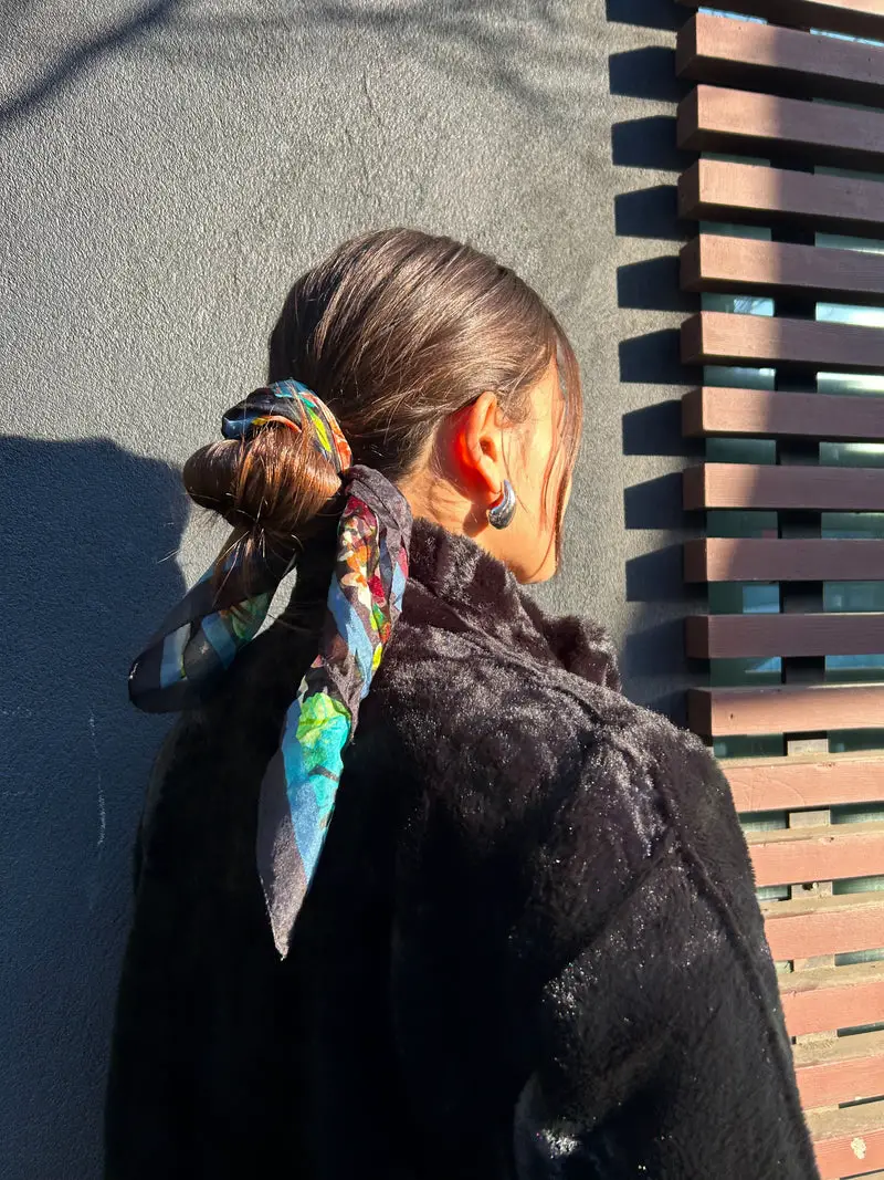 Shoulder-Length Dark Brown Bun with Scarf Shoulder-Length Dark Brown Bun with Scarf — Winter Hairstyles with Scarf