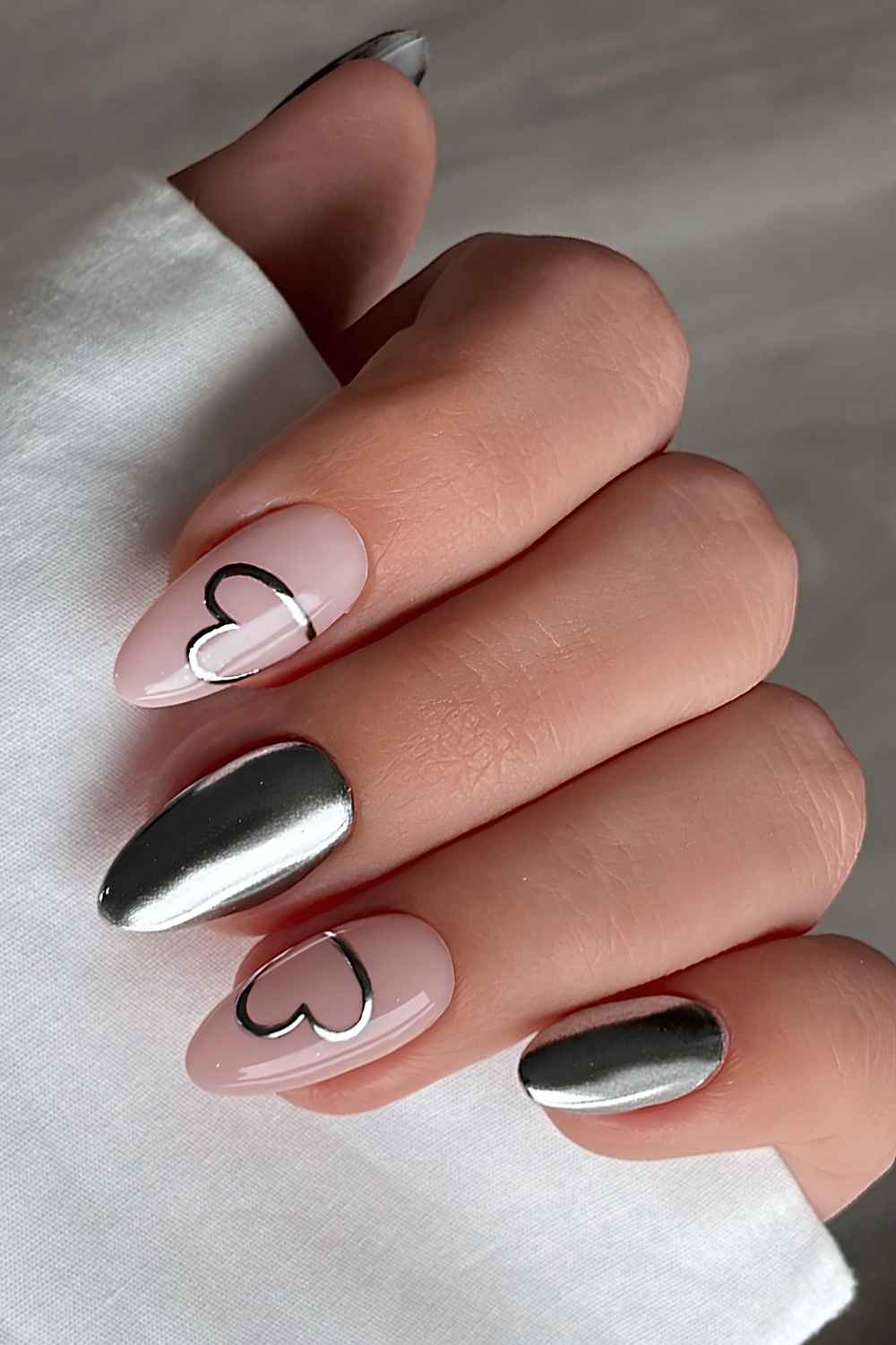 Pale Pink with Silver Heart Outlines and Chrome Accent — Chrome Nail Designs