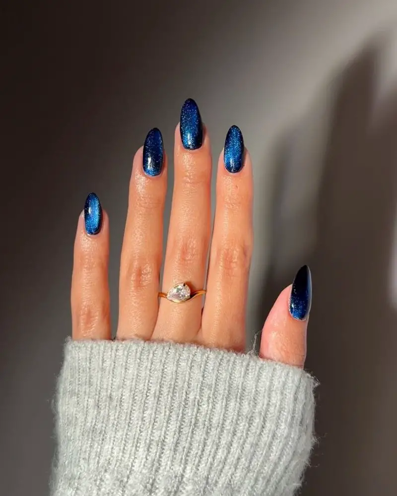 Cat Eye Effect With Swirling Lines Visual Idea — Navy Blue Nails