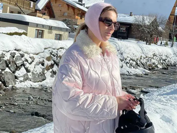 Pink Quilted Puffer and Knitted Headscarf for a Chic Snow Trip — Winter Travel Outfits