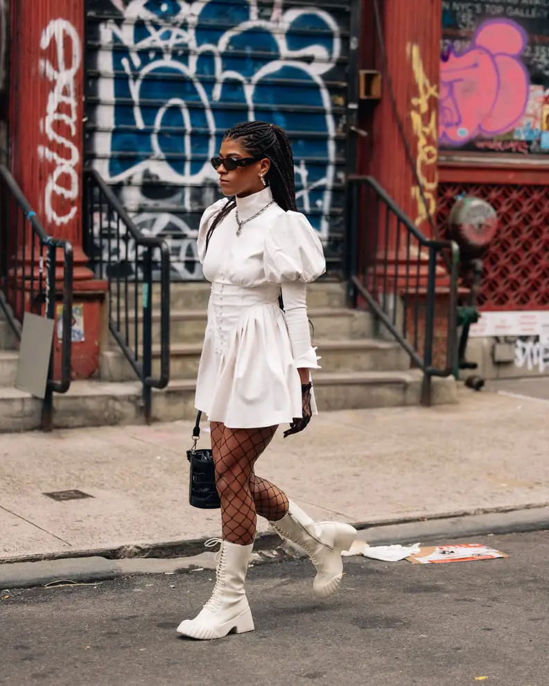 Bold White Mini Dress with Puffed Sleeves and Knee-High Boots — Winter White Outfits