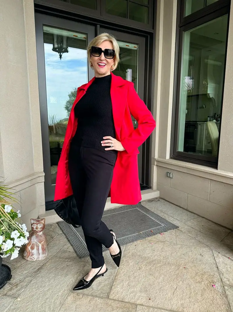 Vibrant Red Coat Over Black Turtleneck and Slim Pants — Casual Winter Outfits for Women Over 50