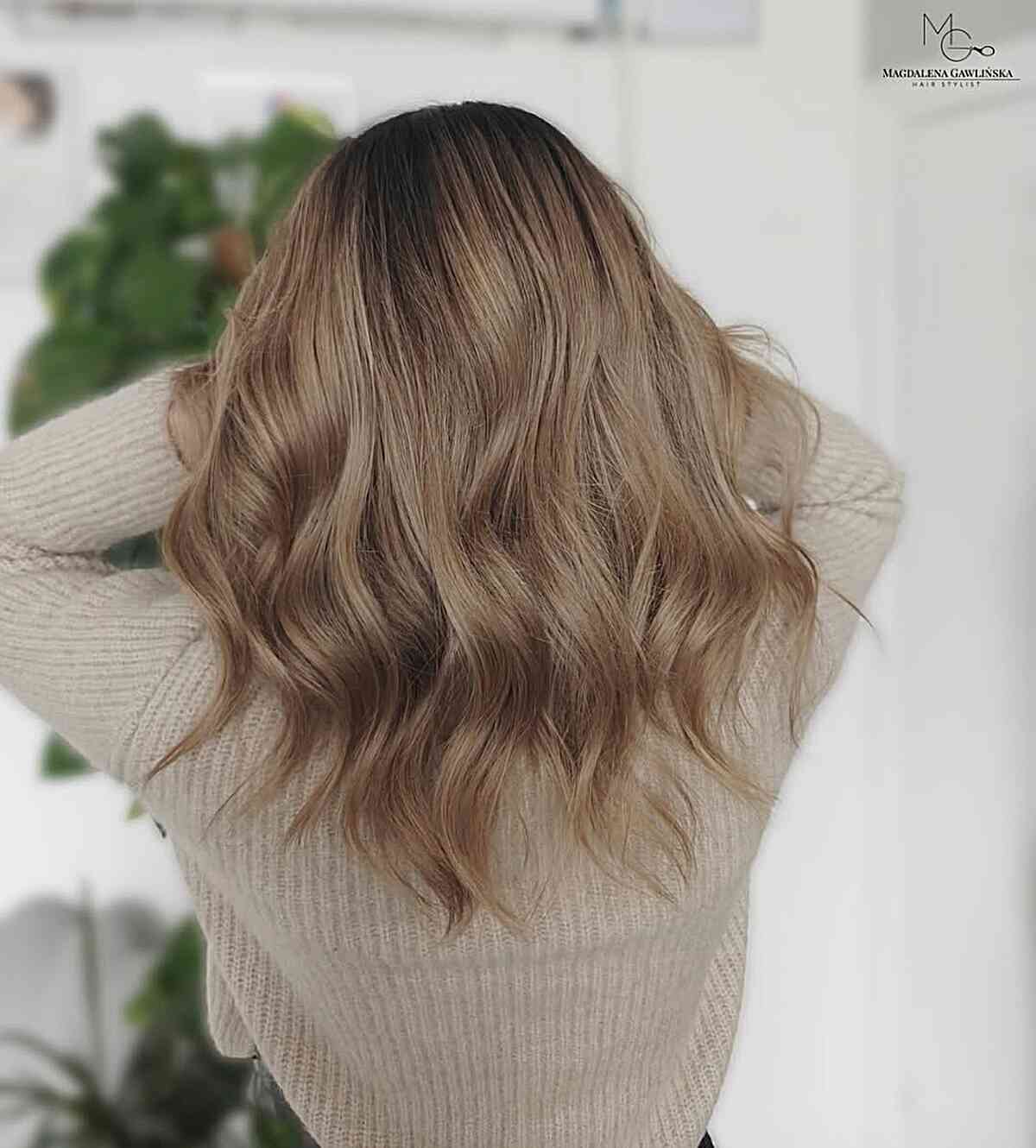 Shoulder-Length Dark Blonde With Caramel Highlights and Curtain Bangs Shoulder-Length Dark Blonde With Caramel Highlights and Curtain Bangs — Low Maintenance Winter Hair Colors