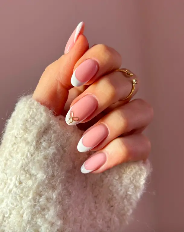 Classic French with Gold Bow Accent Classic French with Gold Bow Accent — Winter Oval Nails