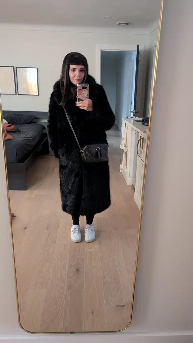 Dramatic Floor-Length Black Faux Fur Coat with Sneakers Dramatic Floor-Length Black Faux Fur Coat with Sneakers — Faux Fur Coat Outfits