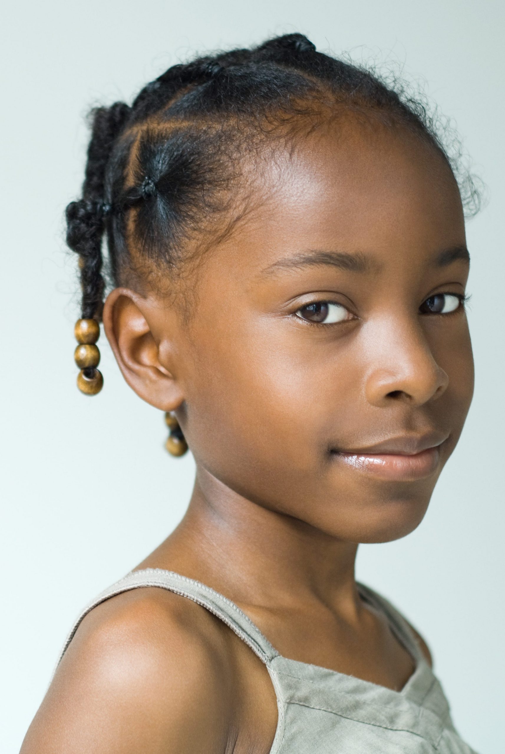 Braided Ponytail with Loose Curls — Winter Hairstyles for Black Kids