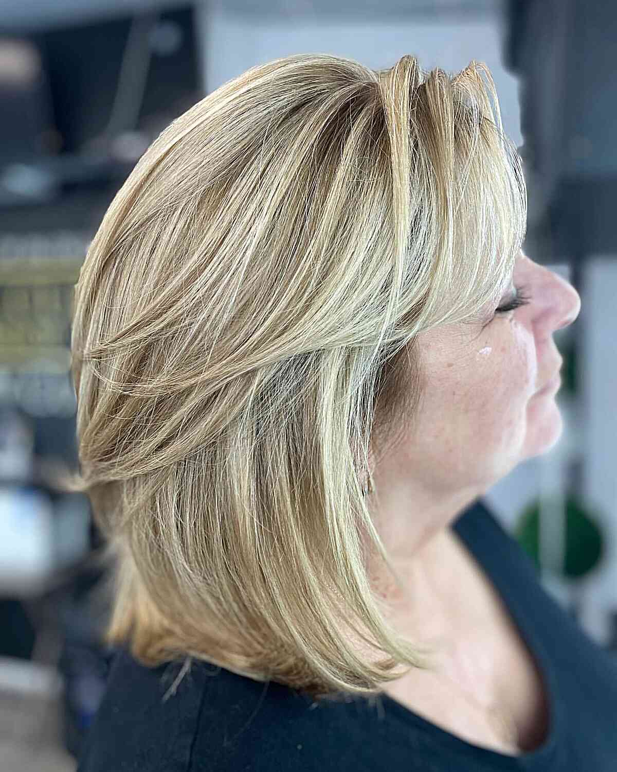 Feathered Ash Blonde Bob With Volume Feathered Ash Blonde Bob With Volume — Winter Hairstyles for Plus Size Women