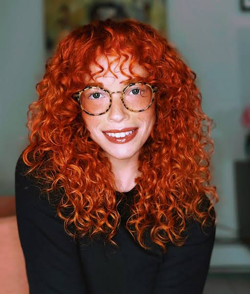 Mid-Back Curly Fiery Copper Red With Curtain Bangs Mid-Back Curly Fiery Copper Red With Curtain Bangs — Winter Hair Colors for Curly Hair