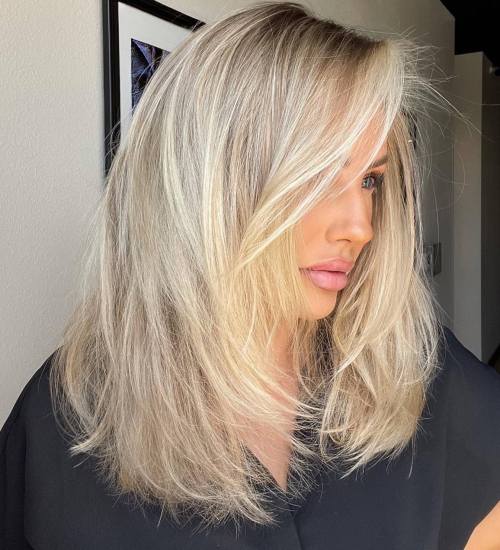 Platinum Blonde Voluminous Blowout Platinum Blonde Voluminous Blowout — Winter Shoulder Length Hairstyles