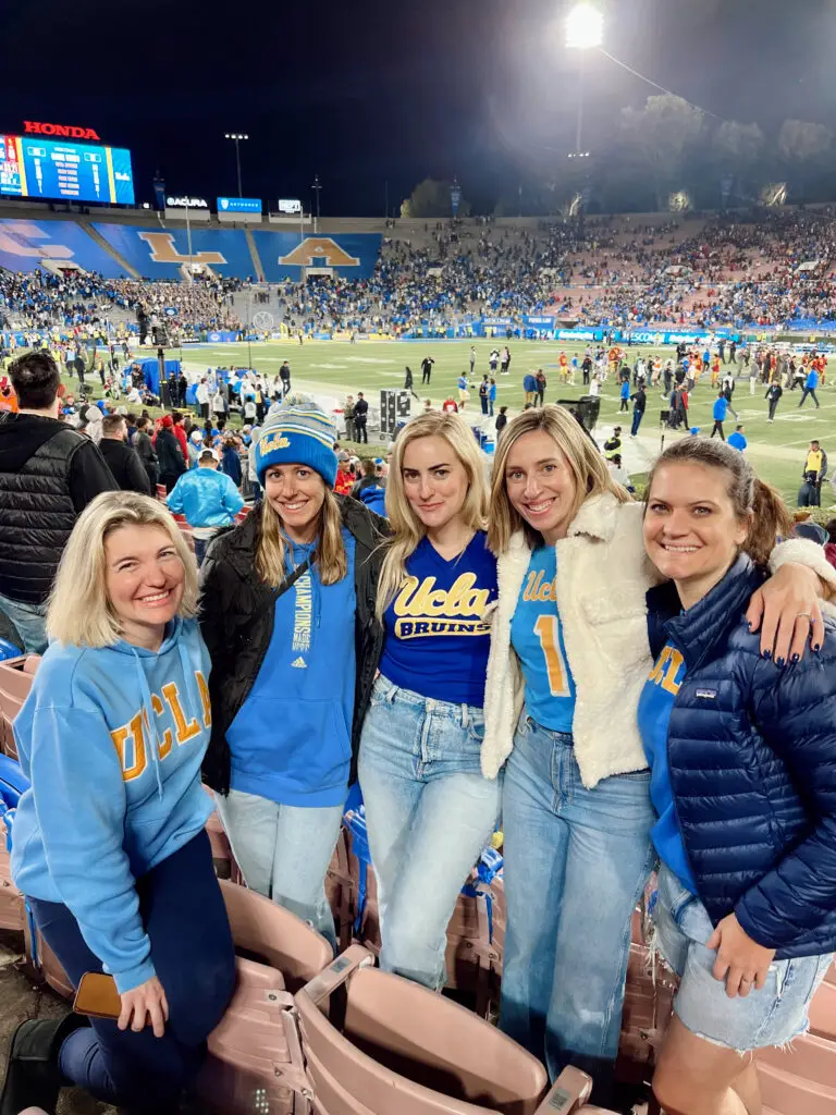 Team Spirit Layers with Denim for a Group Tailgate Team Spirit Layers with Denim for a Group Tailgate — Winter Tailgate Outfits