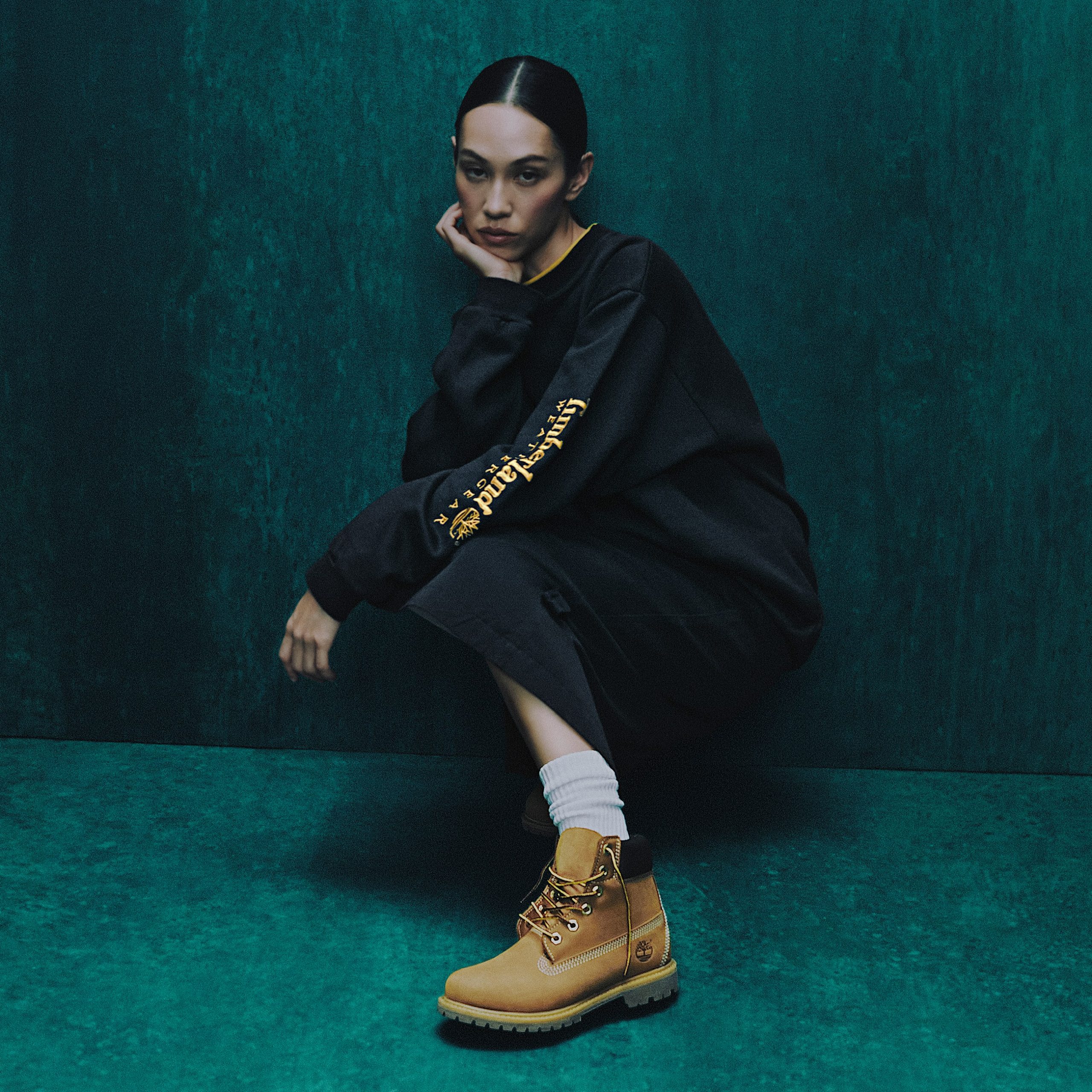 Casual Comfort: Tan Timberlands with a Logo Sweatshirt — Timberland Boots Outfits