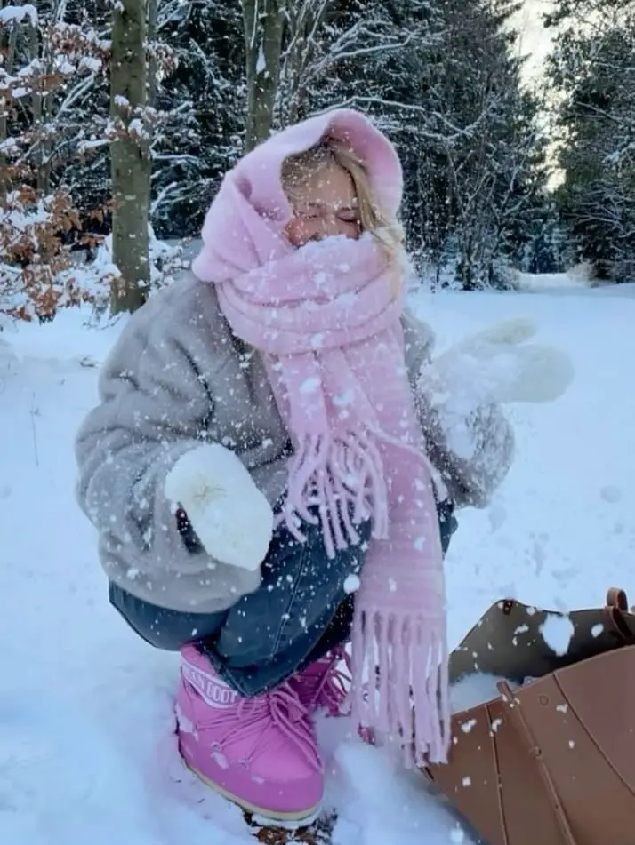 Vibrant Pink Moon Boots in a Snowy Forest Setting Vibrant Pink Moon Boots in a Snowy Forest Setting — Moon Boots Outfits
