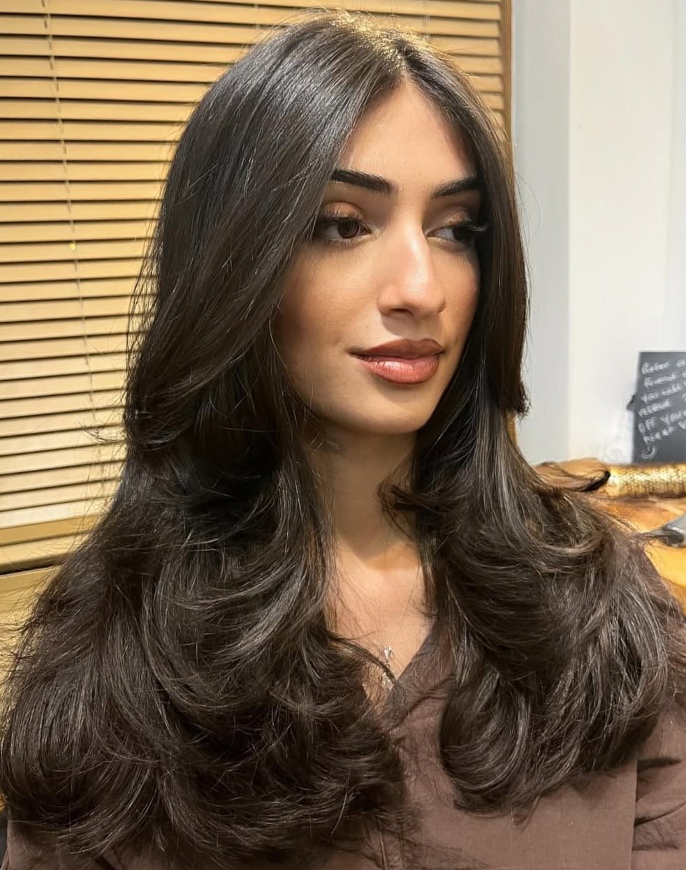 Layered Dark Brown with Curtain Bangs Layered Dark Brown with Curtain Bangs — Winter Haircuts for Oval Faces