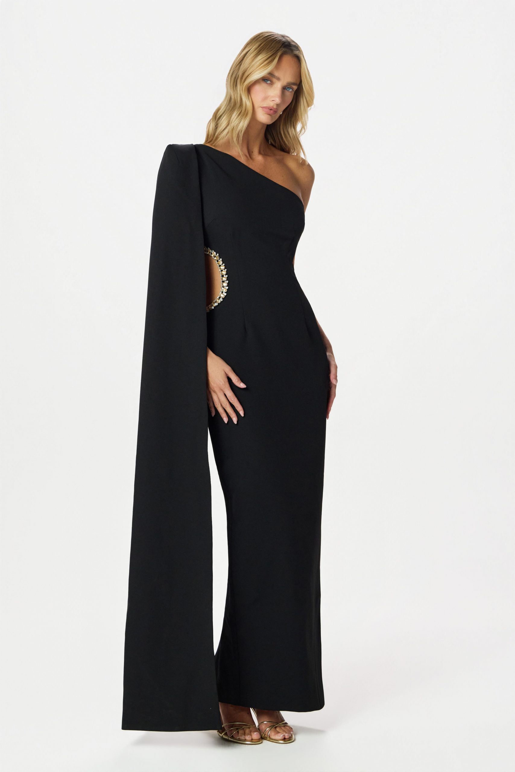 Dramatic Black One-Shoulder Jumpsuit with Cape Sleeve for Formal Weddings — Winter Wedding Guest Outfits