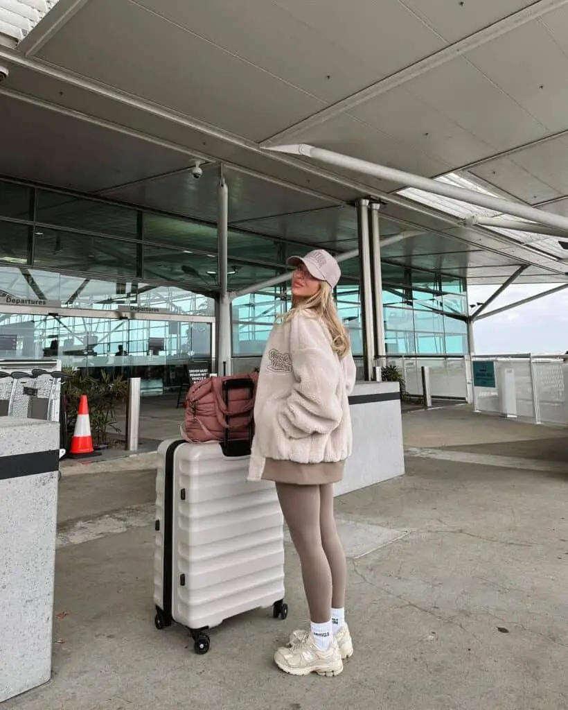 Beige Fleece Jacket with Mini Skirt and Leggings Beige Fleece Jacket with Mini Skirt and Leggings — Winter Airport Outfits