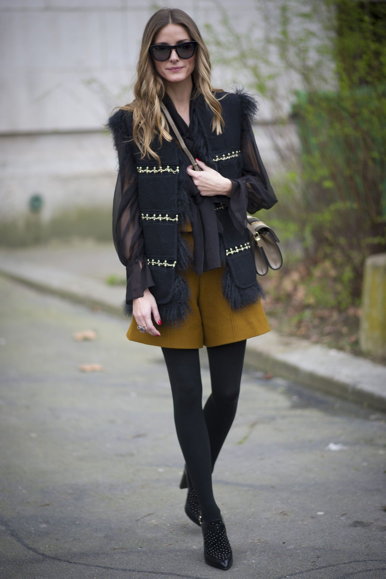 Embellished Vest with Fur Trim Over Sheer Blouse and Shorts Embellished Vest with Fur Trim Over Sheer Blouse and Shorts — Winter Layering Outfits