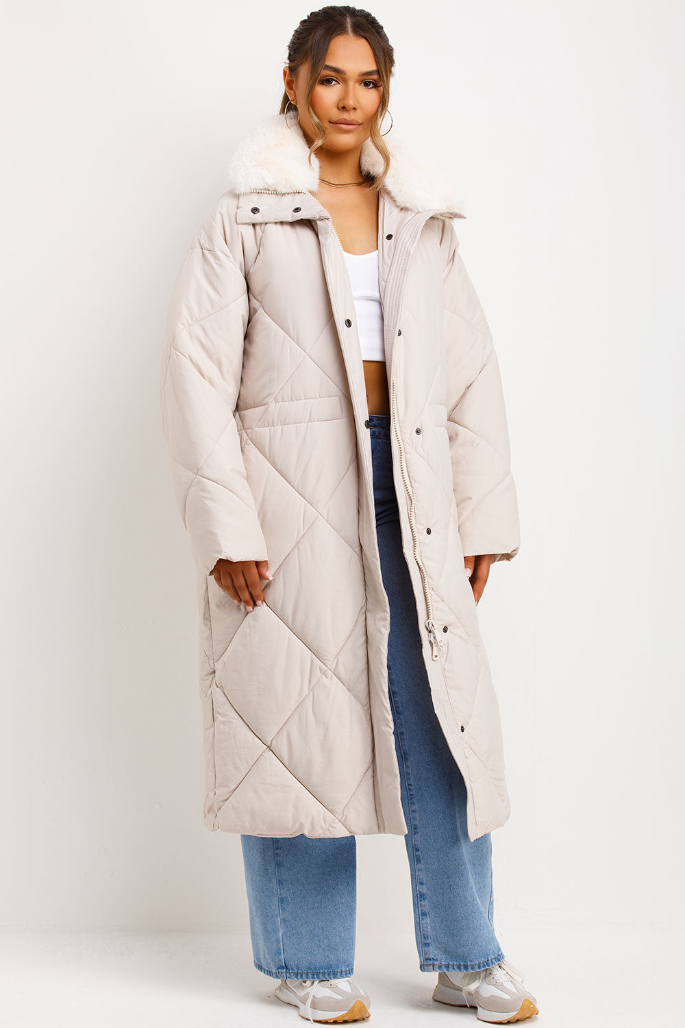Beige Puffer with Crop Top and White Sneakers Beige Puffer with Crop Top and White Sneakers — Long Puffer Coat Outfits