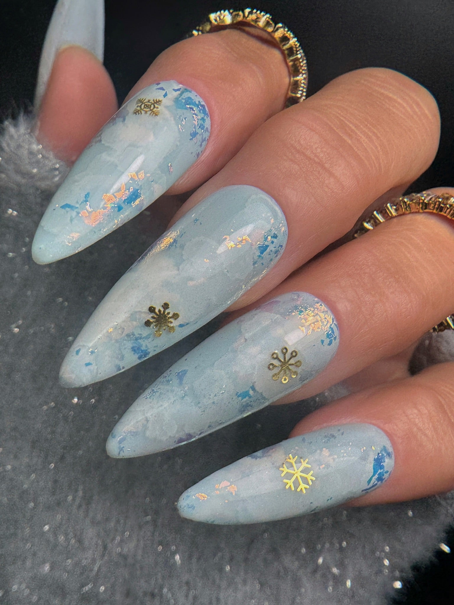 Long Stiletto Marbled Blue with 3D Snowflakes Long Stiletto Marbled Blue with 3D Snowflakes — Winter Vacation Nails