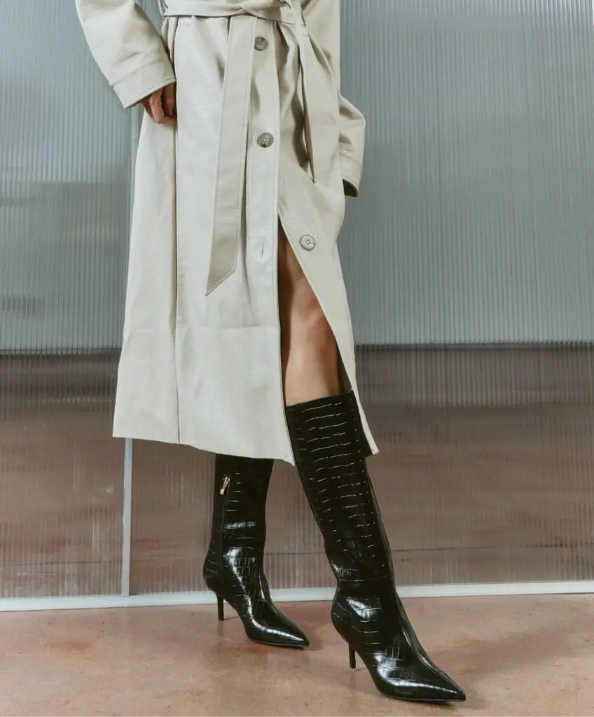 Croc-Embossed Knee-High Boots with a Cream Trench Coat — Winter Boots Outfits