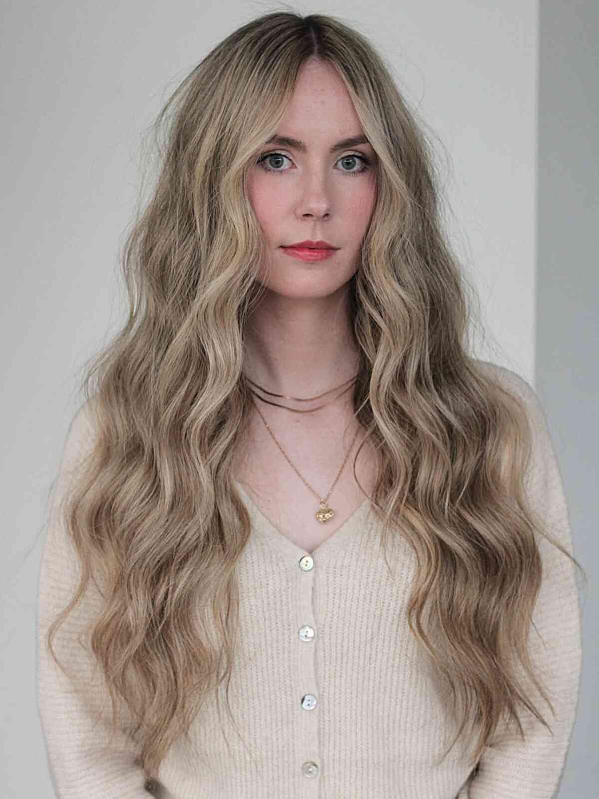 Ash Blonde Collarbone Waves With Curtain Bangs Ash Blonde Collarbone Waves With Curtain Bangs — Winter Hairstyles for Long Hair